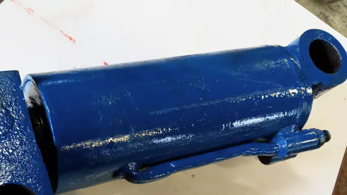 Hydraulic cylinder components prepared for inspection and refurbishment